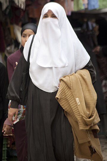 Muslim woman in niqab.