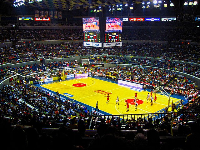 The Araneta Coliseum with the "Big Cube" LED display during a PBA game between San Miguel Beermen and Barangay Ginebra Kings in 2011. This photo was t