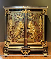 Cupboard. Commissioned for the Concert Room of the Tuileries Palace. Ebony, red scale and brass by Georges-Alphonse Jacob-Desmalter (1834).