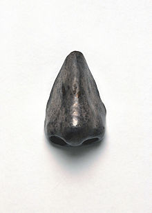 An artificial nose from the 17th-18th century. Such cosmetic replacements were sometimes used due to effects of the disease. Artificial nose, 17th-18th century. (9663809400).jpg