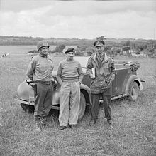 Lieutenant-General Miles Dempsey (right) wearing a Windak smock - 10 June 1944 Bradley - Montgomery - Dempsey.jpg