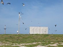 Solar powered weather station on Cato Island Cato Island Station.jpg