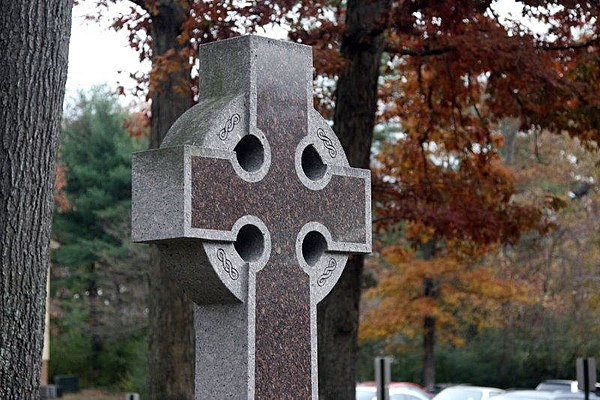 20th–21st century Celtic cross with inscribed symbolism