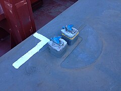 Twistlocks on the deck of Majestic Maersk