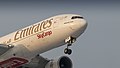 Emirates SkyCargo 777F on final approach for runway 36C (40536764761).jpg