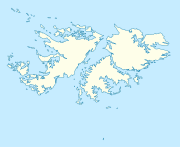 Mapa konturowa Falklandów, blisko prawej krawiędzi nieco u góry znajduje się punkt z opisem „Stanley”