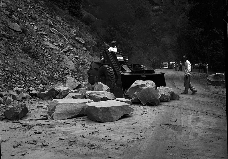 File:File-B&W negative of rock slide. Removing rocks from road with tractor- bystanders watching. -scratches, pits- ; ZION Museum and (b9e3a678801246788a653a6b68a68af8).jpg