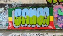 Ganja, a common English synonym for marijuana written in graffiti in Spain Graffiti streetart rastafari.png