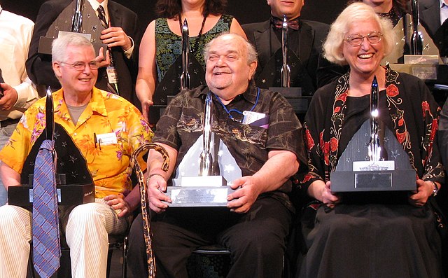 David Hartwell, Charles N. Brown, and Connie Willis pose with the 2008 Hugo Awards