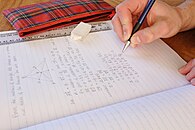 A person doing geometry homework Homework - vector maths.jpg
