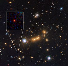 MACS0647-JD is very young and only a tiny fraction of the size of the Milky Way. Hubble spots candidate for most distant known galaxy.jpg