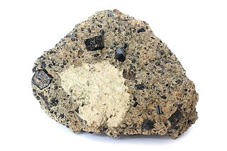 <span class="mw-page-title-main">Kaersutite</span> Calcic titanium bearing amphibole mineral