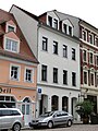 Wohnhaus in geschlossener Bebauung, Hinterhaus und Seitenflügel zum Hof