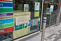 Library book drop box, Woking England.jpg