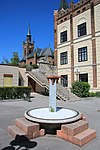 Fountain in front of the higher education institute for fashion and clothing technology Mödling