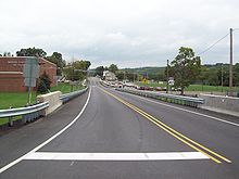 Main Street in Marion Center as viewed from US 119. Marion Center Area High School is located on the left and the East Mahoning Community Park is on the right. Marion Center, Pennsylvania.jpg