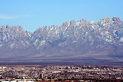 The Organ Mountains tower over the Mesilla Valley (Las Cruces, NM in the foreground). MesillaValley Organs.jpg