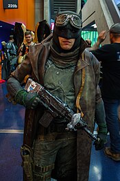 Cosplayer wearing Batman's "Knightmare" outfit as portrayed in the DCEU Montreal Comiccon 2016 - Desert Batman (28181487671).jpg