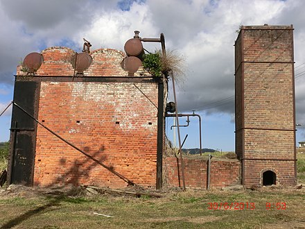 Brick enclosure of a Stirling boiler in Queensland, Australia, originally fired on sugarcane bagasse. Chimney is to the right.