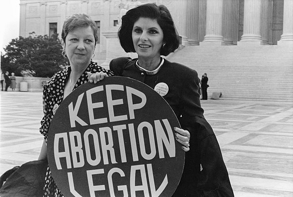 Allred (right) with client Norma McCorvey ("Jane Roe" in Roe v. Wade), 1989