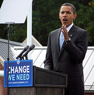 Barack Obama speaking at a campaign rally in A...