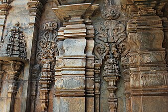 Outer wall relief Kirtimukha on half pilaster in the Tarakeshwara temple at Hangal.JPG