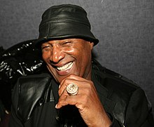 Paul Mooney - the cool, fun,  actor, comedian, writer,   with Afro-American roots in 2024