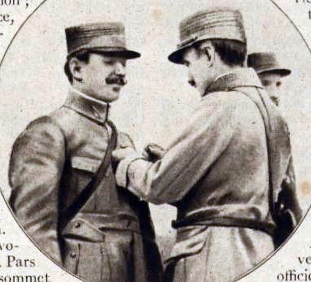 The "first French ace", Frenchman Adolphe Pégoud being awarded the Croix de guerre.