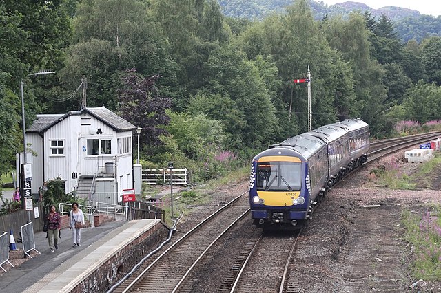 An Abellio ScotRail train to Glasgow Queen Street approaching Pitlochry in July 2018