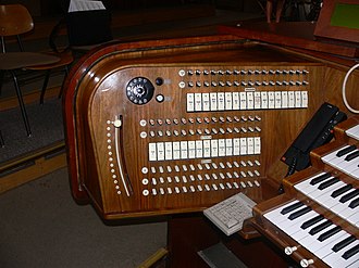 Left-half of setterboards on the console: two rows of register rocker switches for two free combinations per manuals or pedalboard (Organ at the Liebfrauenkirche Ravensburg) RV Liebfrauenkirche Orgel Spieltisch Register.jpg