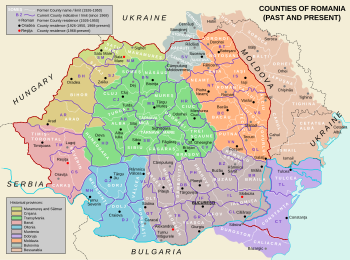 Esquema que muestra el territorio de la actual Rumanía y sus condados superpuestos sobre el mapa coloreado de los condados de entreguerras.