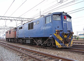 No. E1577 in Spoornet blue livery with outline numbers at Kaalfontein, Gauteng, 3 October 2006