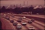 Thumbnail for File:SMOKE-BELCHING CHIMNEYS AND SMOG-OBSCURED CITY - NARA - 545463.jpg