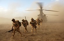 Soldiers from 3 Scots (The Black Watch) deploy from a Chinook helicopter at the start of an anti-narcotics operation in Sangin, Afghanistan, in 2009. Soldiers from 3 Scots Deploy from a Chinook Helicopter in Afghanistan MOD 45151987.jpg