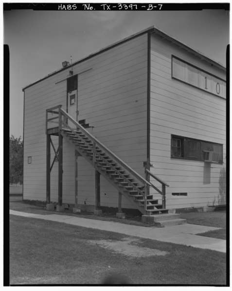 File:Staircase on south side of Building 1009, (enlisted waves' barracks), looking southeast - Naval Air Station Chase Field, Building 1009, Essex Street, .68 mile South-southeast HABS TEX,13-BEEVI.V,1B-7.tif
