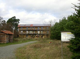 A straw bale house
with Solar panels Strohpolis.jpg