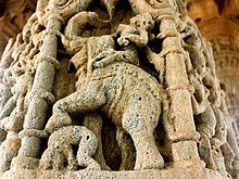 Execution by elephant carved on a pillar of the 11th-12th century Modhera Sun Temple in Gujarat, India Sun Temple - Modhera - Gujarat - 002.jpg