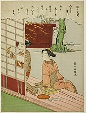 Two women on an engawa, one with a roll of paper and a pot of glue, patching shoji, the other looking on