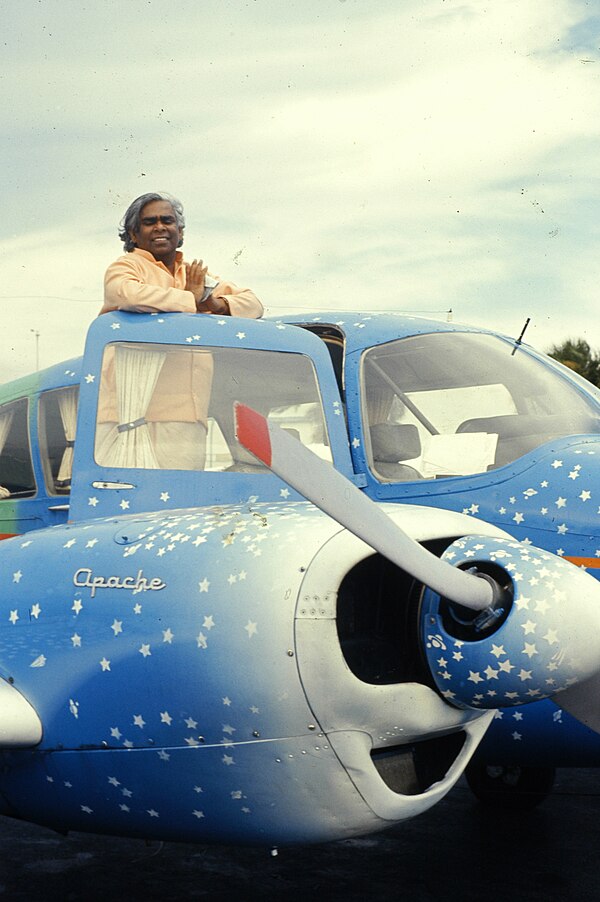 As "The Flying Swami" in his Piper Apache