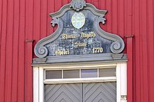 The Angell coat of arms. Thomas Angells Stuer portal - cropped.jpg