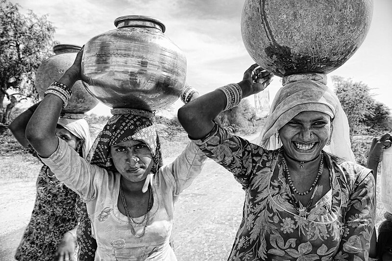 File:Three women carrying water pots, Rajasthan (6344112020).jpg