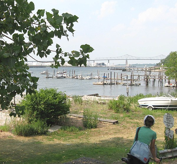 A view of Arthur Kill, the waterway between Staten Island and the New Jersey mainland; the Outerbridge Crossing is in the background