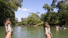 Tubing down the Mopan River is a popular tourist activity in Bullet Tree Falls. Tubing down the Mopan river in Bullet Tree Falls.JPG