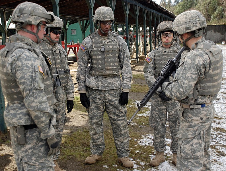 File:US Navy 090226-N-0101J-024 A Soldier assigned to the 191st Infantry Brigade, right, instructs Sailors participating in live-fire training exercises at the Expeditionary Combat Readiness Center (ECRC) Detachment at Fort Lewis, W.jpg