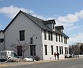 The w:Whitewater Hotel, listed on the National Register of Historic Places.   This file was uploaded with Commonist.