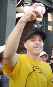 Hample holding up a ball he caught during the 2021 Home Run Derby Zack Hample 2021 (cropped).png