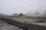 Миниатюра для Файл:ASC Leiden - F. van der Kraaij Collection - 26 - 005 - Un travailleur utilise un buldozer pour niveler la terre d'une nouvelle route - En route de Tenkodogo, Burkina Faso, 1983.tif