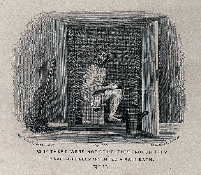 File:A man seated in a cubicle is being sprayed with water Wellcome V0047657.jpg