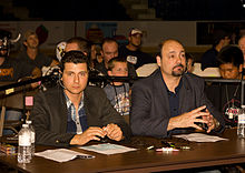 Korderas (right) and Arda Ocal ringside doing commentary at an independent wrestling show in 2012 Arda Ocal and Jimmy Korderas.jpg
