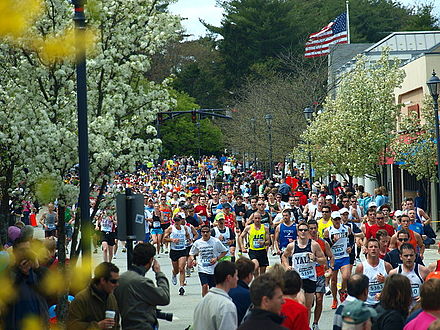 Participants in the 2010 Boston Marathon in Wellesley, just after the halfway mark